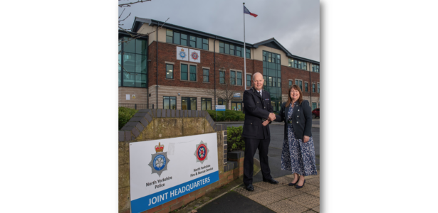 Tim Forber and Commissioner Zoe standing outside Joint services HQ